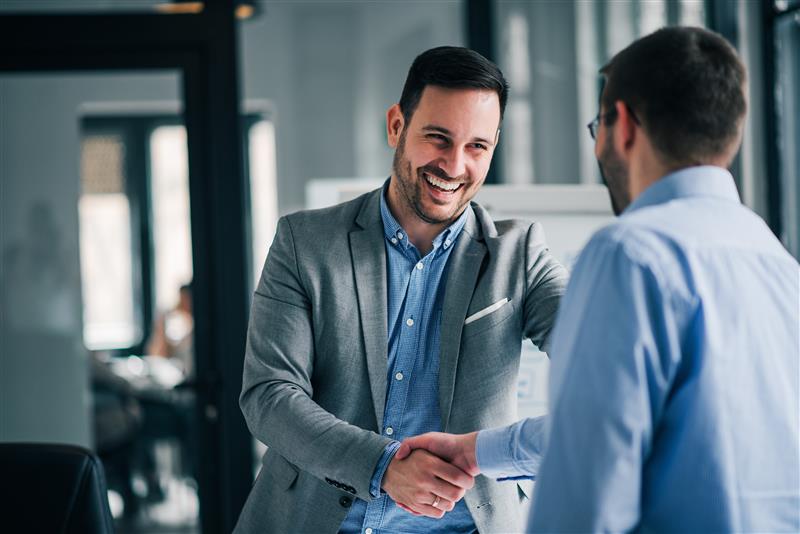 Cooperation Business Men Shaking Hands